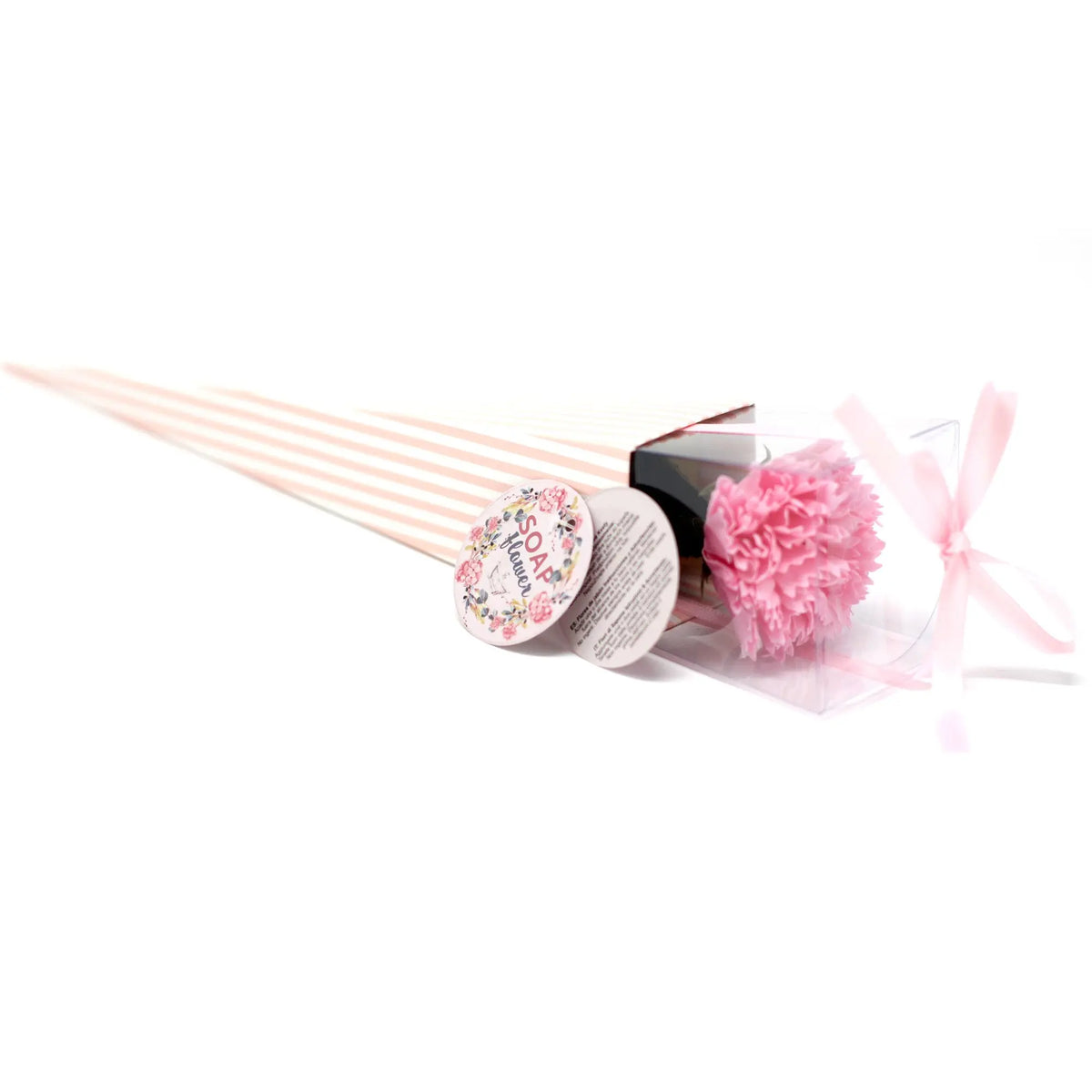 Clavel de jabón rosa en caja cónica decorativa de rayas con lazo, ideal para regalo.