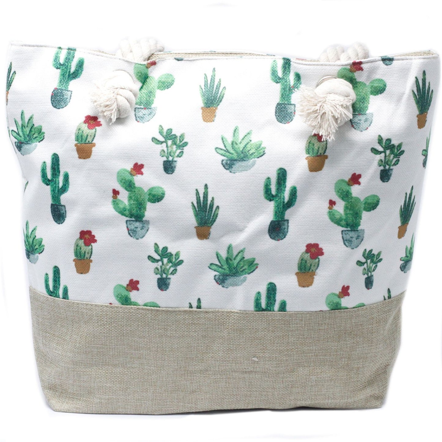 Bolso shopper de tela blanca con estampado de cactus, base beige y asas de cuerda gruesa anudadas.