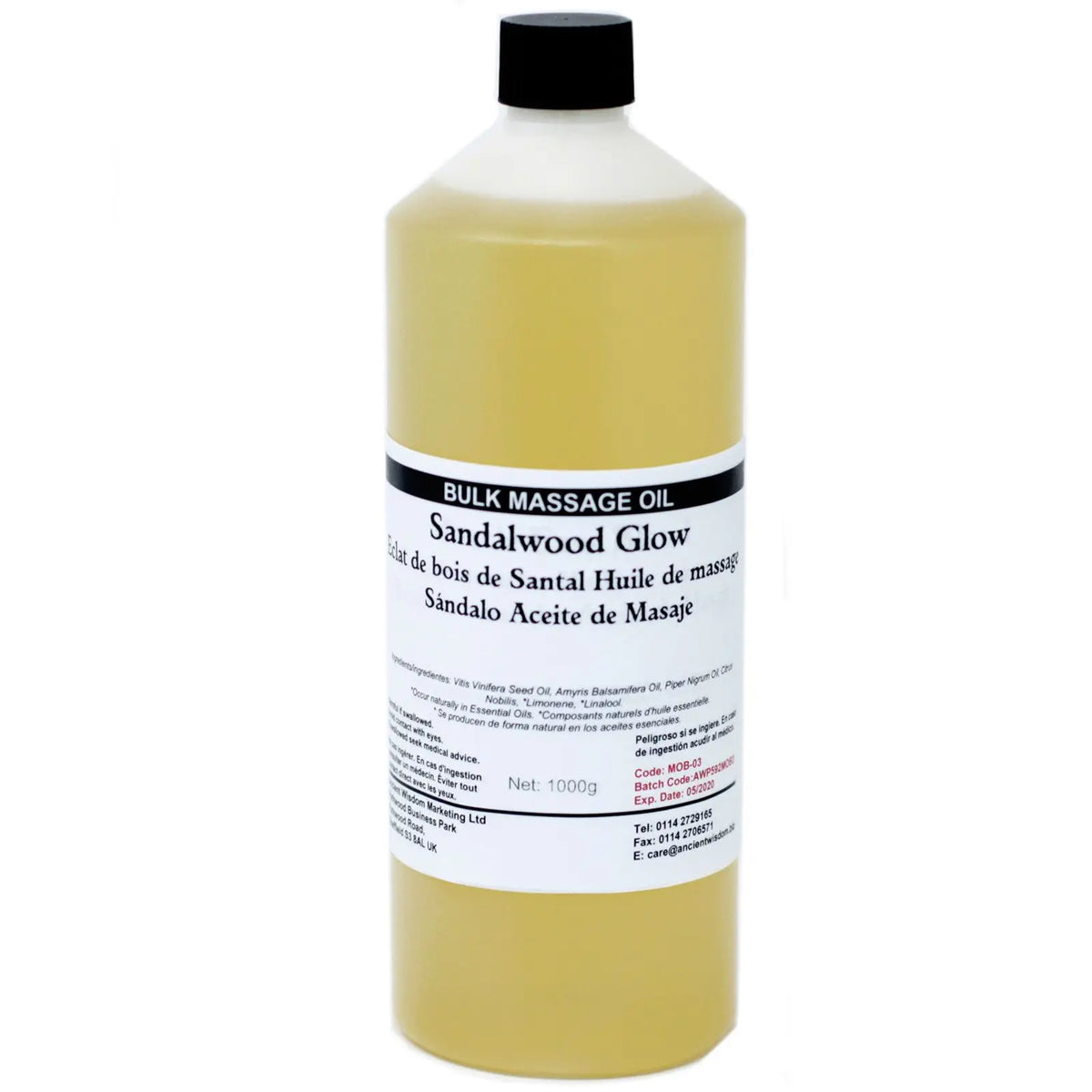 Botella de plástico de 1kg con aceite de masaje color amarillo claro y etiqueta informativa, sobre fondo blanco.
