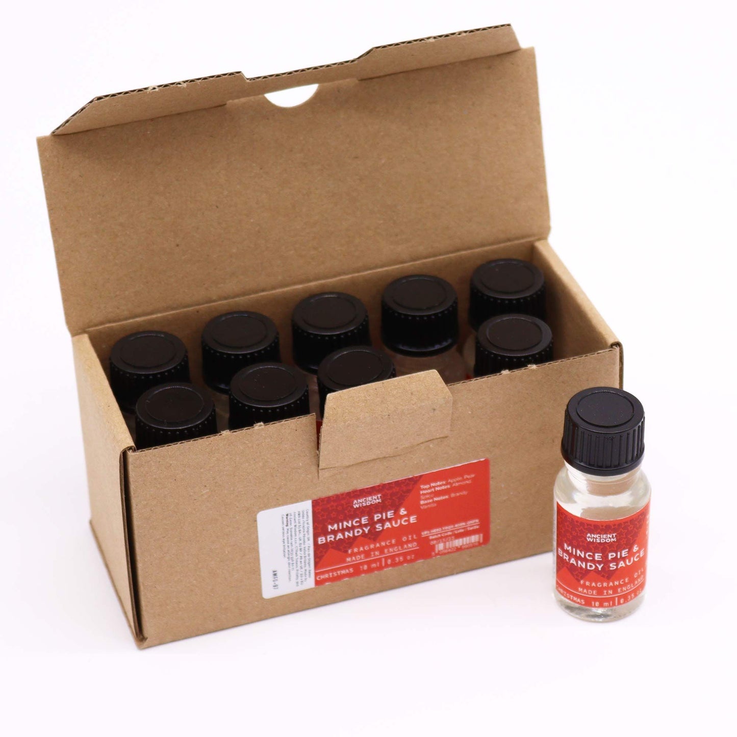 Caja de cartón con frascos de vidrio de 10 ml de aceite aromático de pastel de frutas y salsa de brandy.
