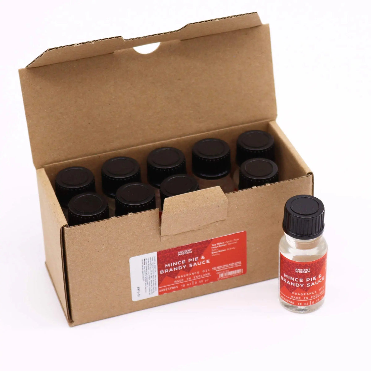 Caja de cartón con frascos de vidrio de 10 ml de aceite aromático de pastel de frutas y salsa de brandy.