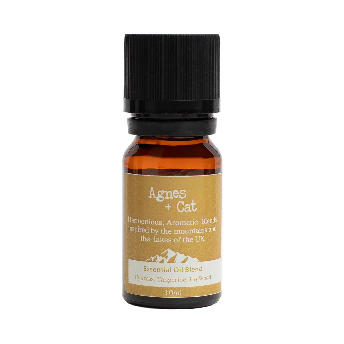 Frasco de vidrio ámbar de 10ml con tapa negra y etiqueta dorada de mezcla de aceites esenciales Agnes + Cat.
