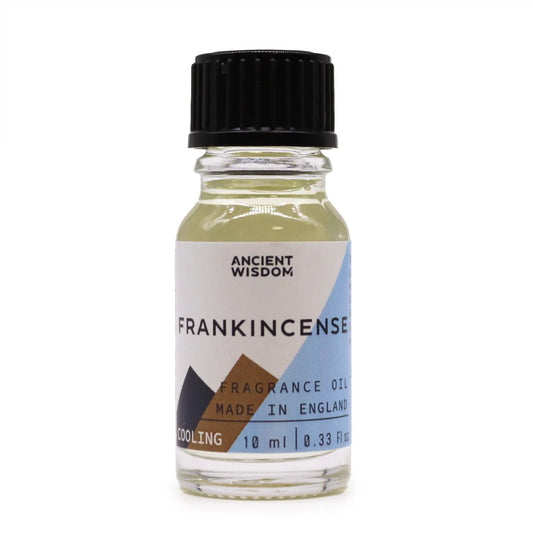 Frasco de vidrio transparente de 10ml con tapa negra, contiene aceite de fragancia de incienso con etiqueta minimalista.