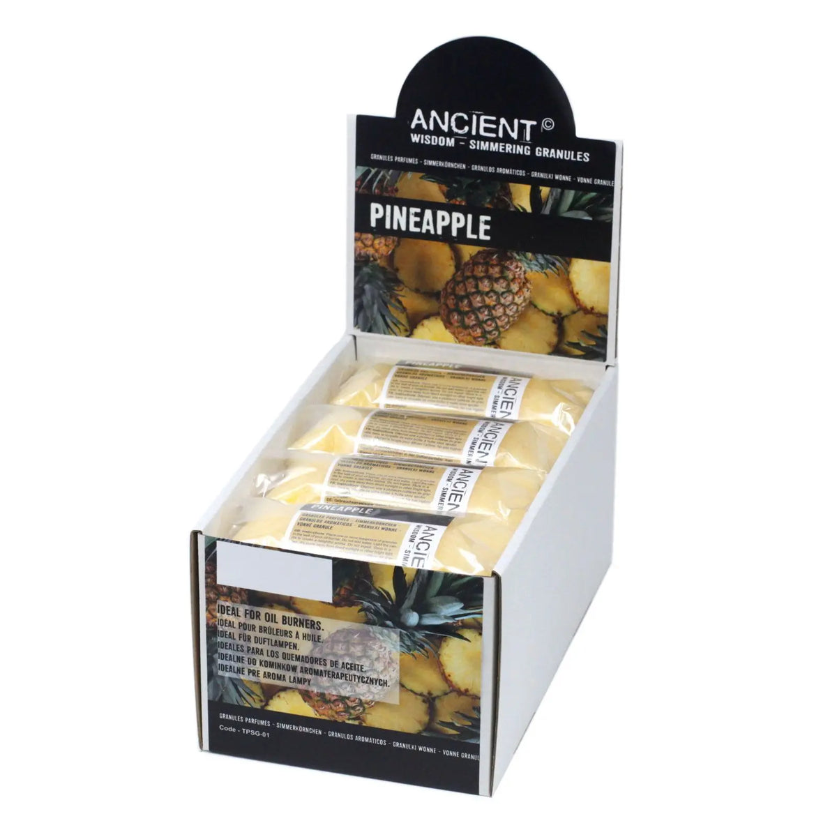 Caja expositora de cartón con sobres individuales de gránulos aromáticos de piña amarillos sobre fondo de frutas.