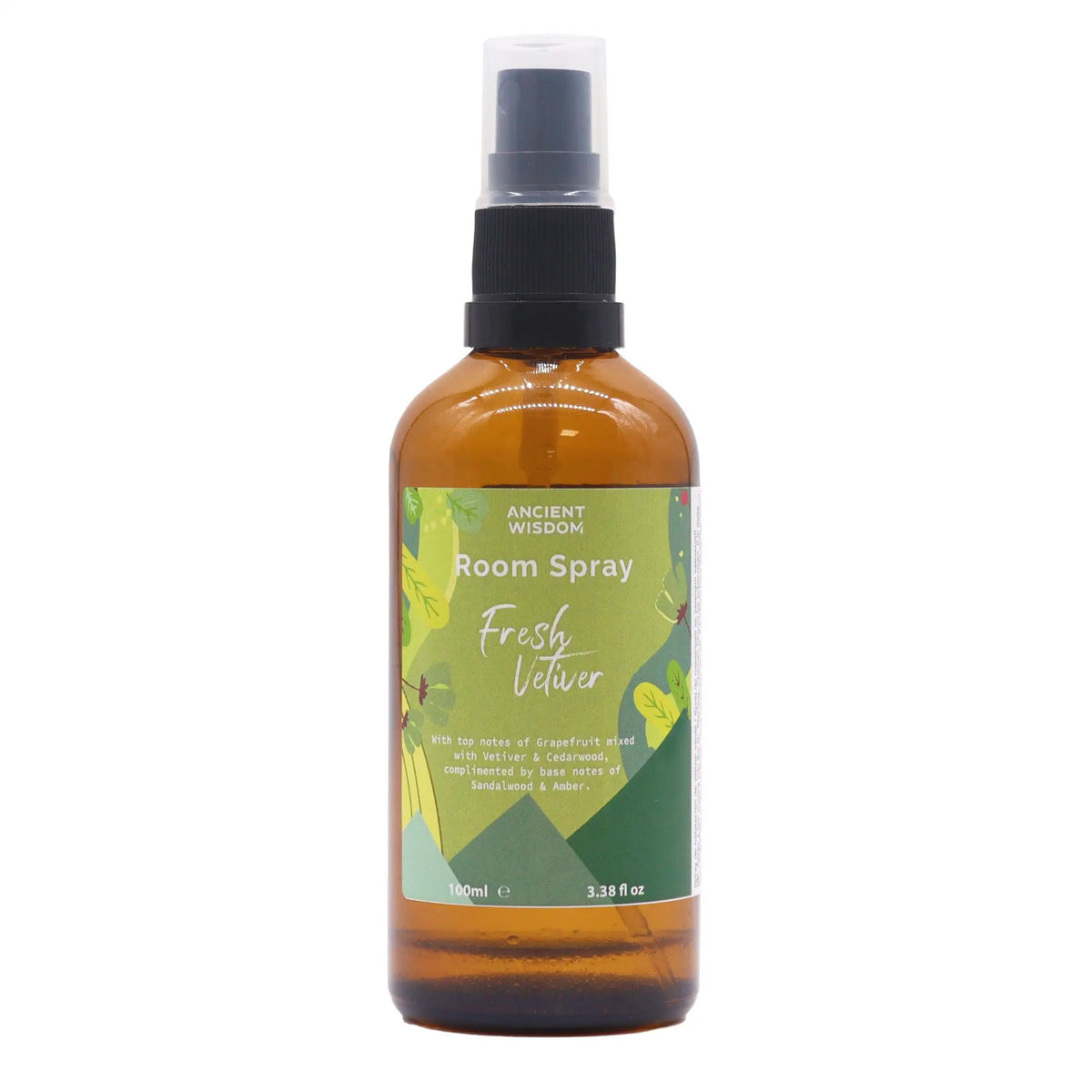 Spray ambientador de 100ml en botella de vidrio ámbar con atomizador negro y etiqueta verde ilustrada con plantas.