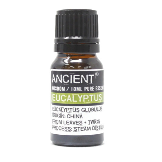 Frasco de vidrio ámbar de 10 ml con aceite esencial de eucalipto, tapón negro y etiqueta blanca con texto informativo.