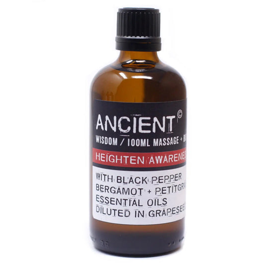 Frasco de vidrio ámbar de 100ml con aceite de masaje, etiqueta negra y roja con información del producto.