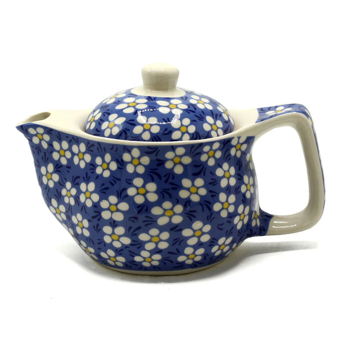 Tetera de cerámica azul con estampado de margaritas blancas, diseño compacto, 350ml, con tapa y asa ergonómica.