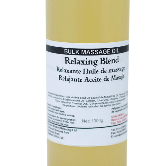 Botella cilíndrica de 1kg con aceite de masaje amarillo traslúcido y etiqueta blanca con texto informativo en español.