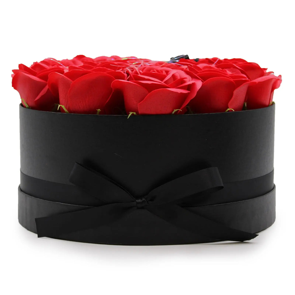 Caja redonda negra con lazo decorativo que contiene 14 rosas de jabón rojas de estilo elegante y romántico