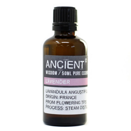 Frasco de vidrio ámbar de 50ml con tapa negra y etiqueta blanca, conteniendo aceite esencial de lavanda.