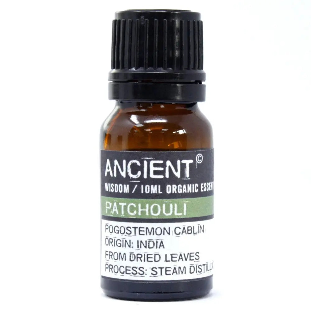 Frasco de vidrio ámbar de 10ml con aceite esencial de pachulí Ancient Wisdom y tapa negra sobre fondo blanco.