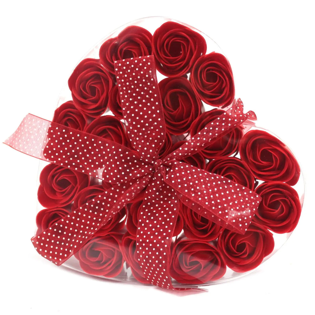 Set de 24 rosas de jabón rojas en caja transparente con forma de corazón decorada con un lazo de lunares blancos