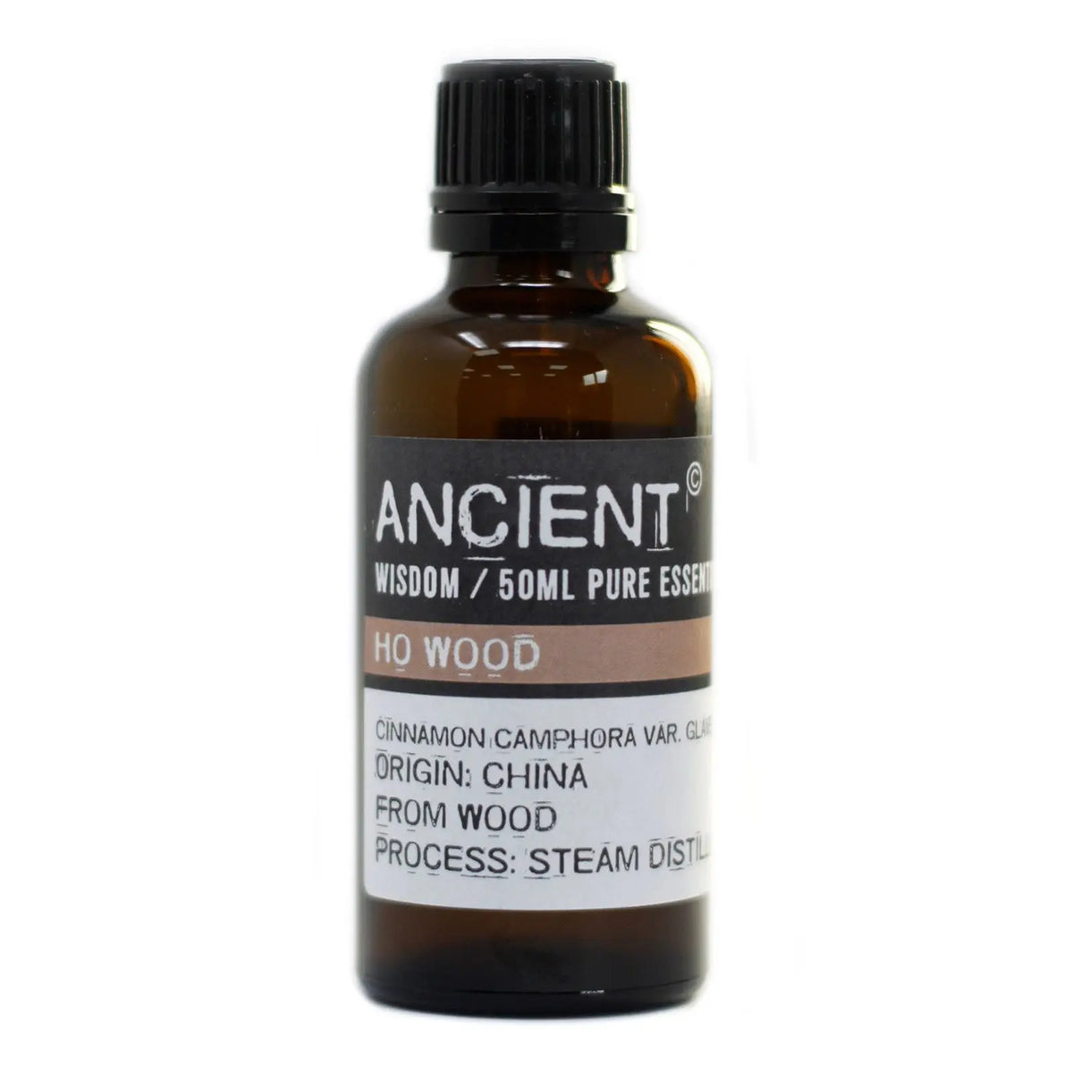 Frasco de vidrio ámbar de 50ml con tapón negro y etiqueta informativa sobre aceite esencial de madera de Ho.