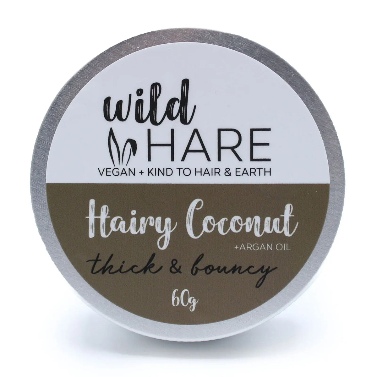 Lata redonda de metal con etiqueta blanco-marrón para champú sólido Wild Hare de Coco (60g). Estilo vegano y natural.