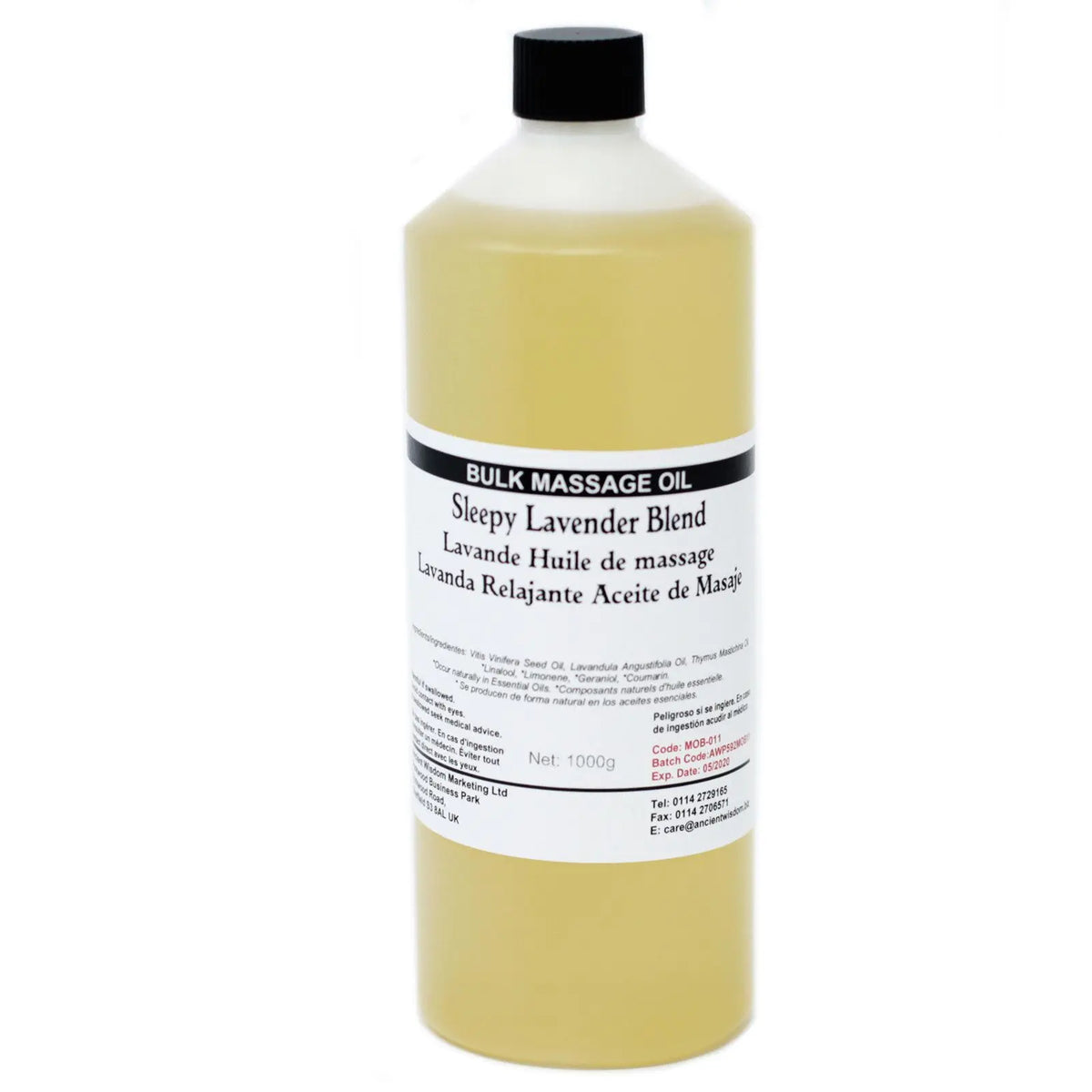 Botella de plástico de 1kg con aceite de masaje color amarillo claro y etiqueta informativa sobre fondo blanco.