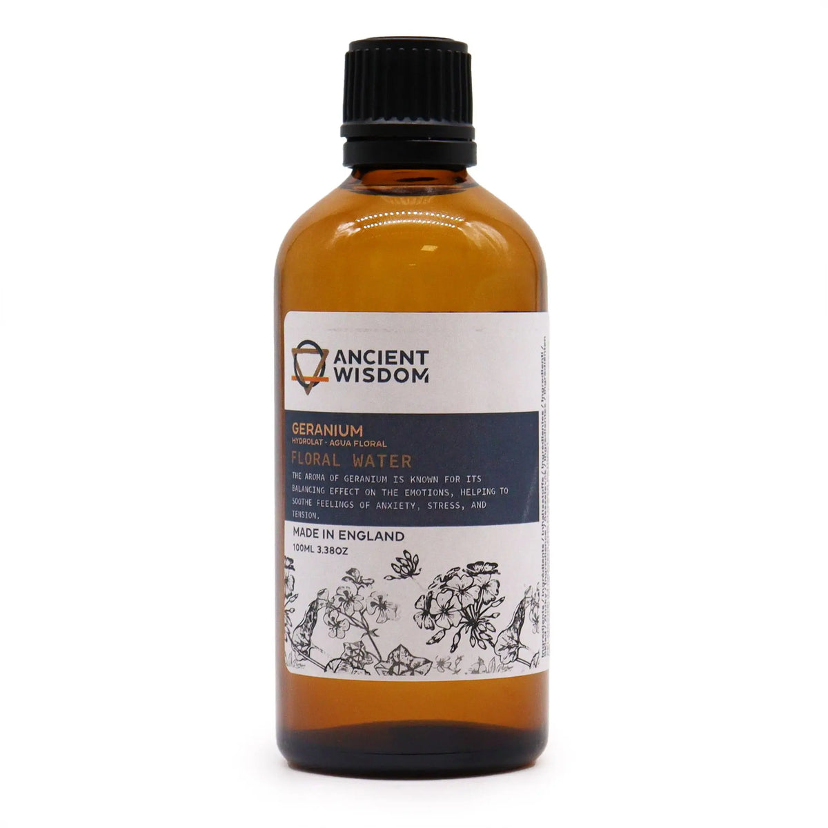 Botella de vidrio ámbar de 100ml con tapón negro y etiqueta blanca con ilustración de flores de geranio.