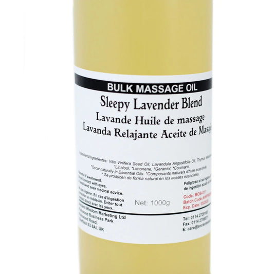 Envase cilíndrico de 1kg con aceite de masaje de tono amarillento y etiqueta informativa en blanco y negro.
