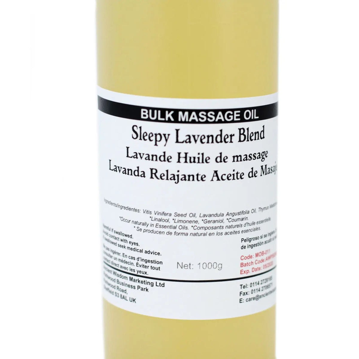 Envase cilíndrico de 1kg con aceite de masaje de tono amarillento y etiqueta informativa en blanco y negro.
