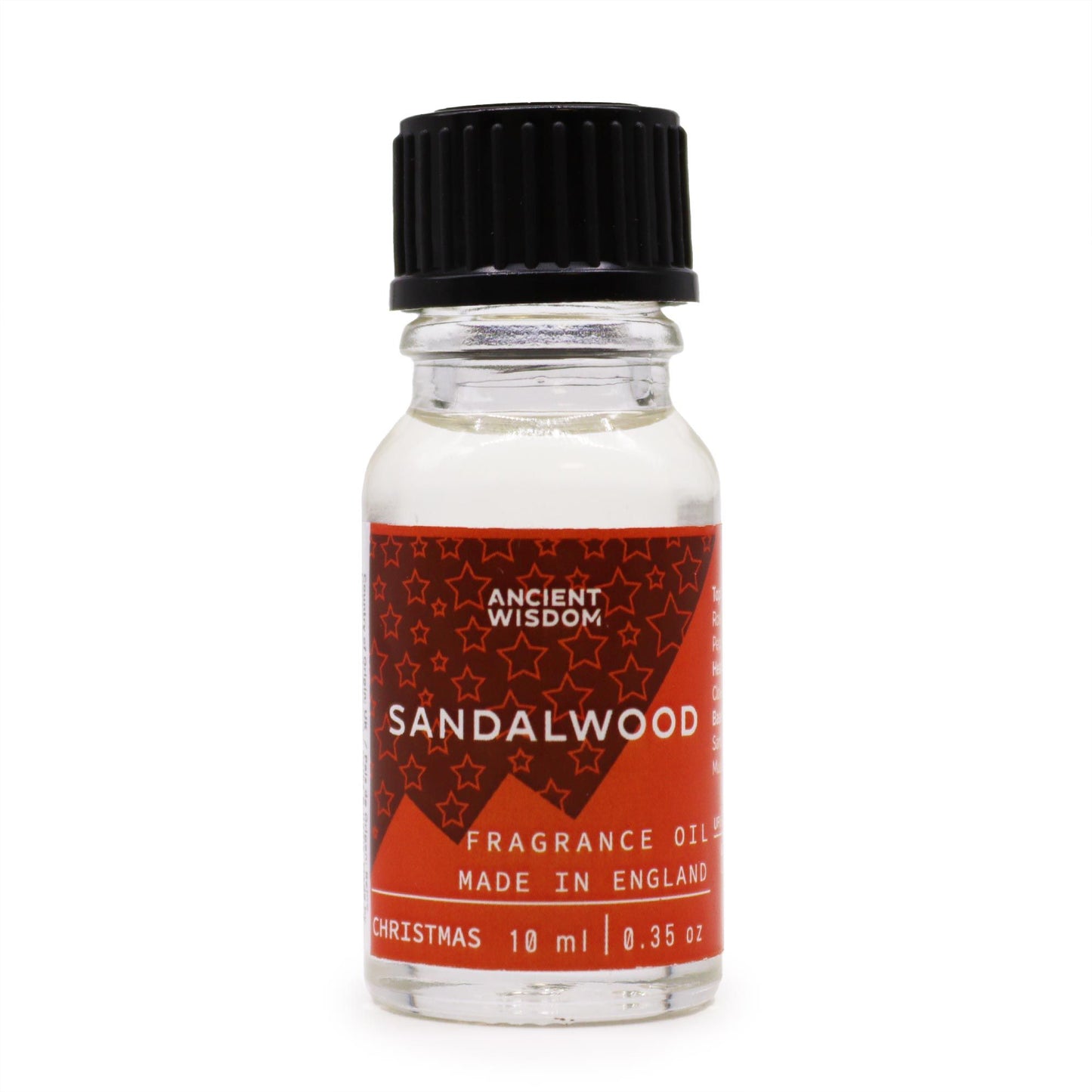 Frasco de vidrio de 10 ml con aceite, tapa negra y etiqueta roja con diseño de estrellas y texto Sandalwood.