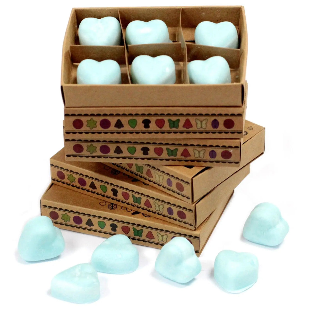 Cajas de cartón con 6 ceras de soja azules en forma de corazón, decoradas con iconos coloridos. Fondo blanco.