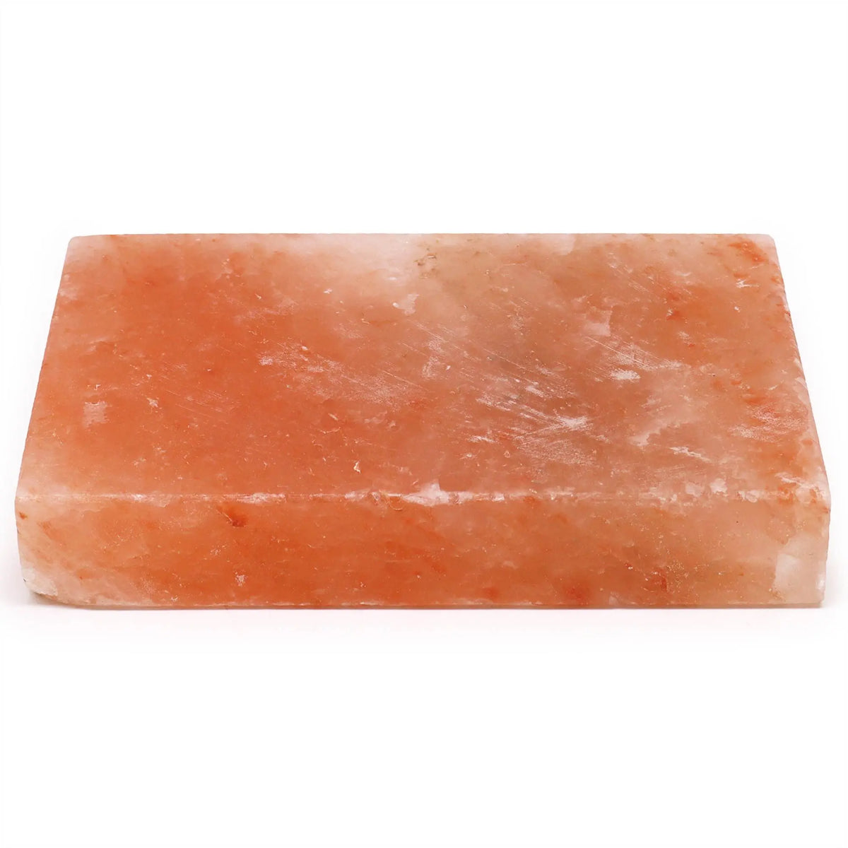 Plancha rectangular de sal del Himalaya, de color rosa translúcido y textura natural, sobre fondo blanco.