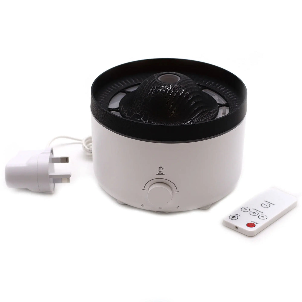 Difusor de aromas eléctrico blanco y negro, forma cilíndrica con efecto volcán, incluye cable y mando a distancia.