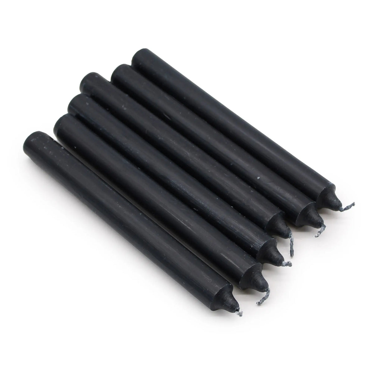 Paquete de 10 velas delgadas de color negro sólido con acabado rústico, dispuestas en paralelo sobre fondo blanco.