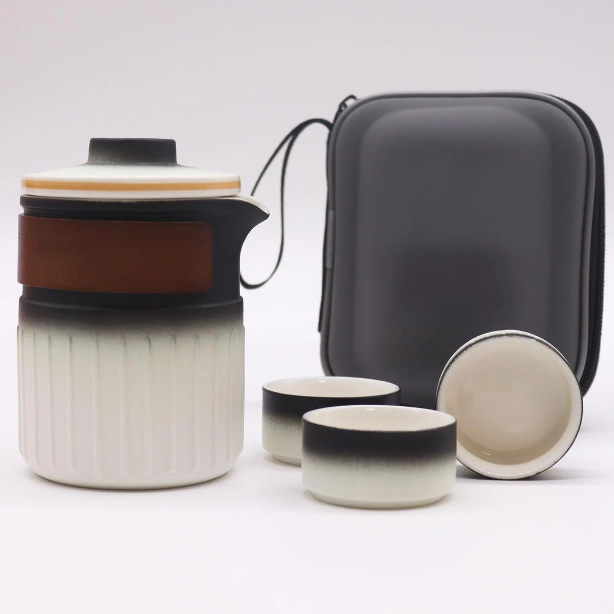 Set de té con tetera y tres tazas de cerámica degradada blanco y negro con estuche protector de viaje moderno