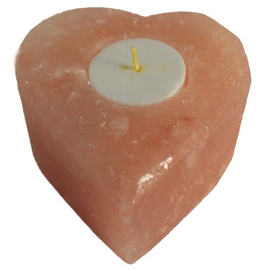 Soporte para vela de sal del Himalaya con forma de corazón, color rosa traslúcido y textura rugosa. Incluye una vela.