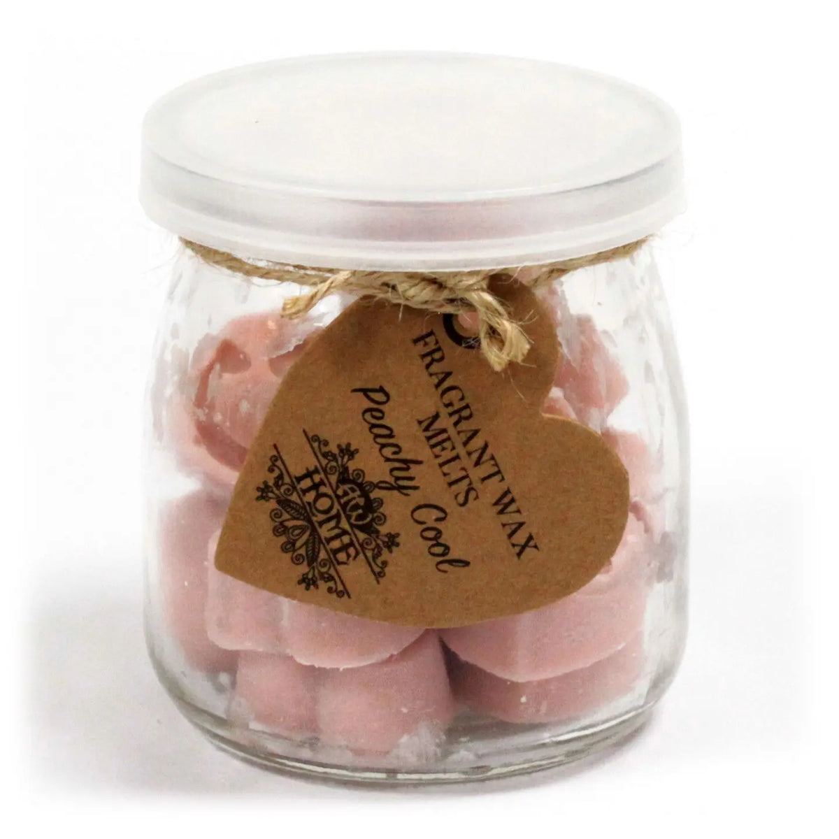 Frasco de cristal con tapa conteniendo pastillas de cera de soja rosa, con etiqueta en forma de corazón y cuerda.