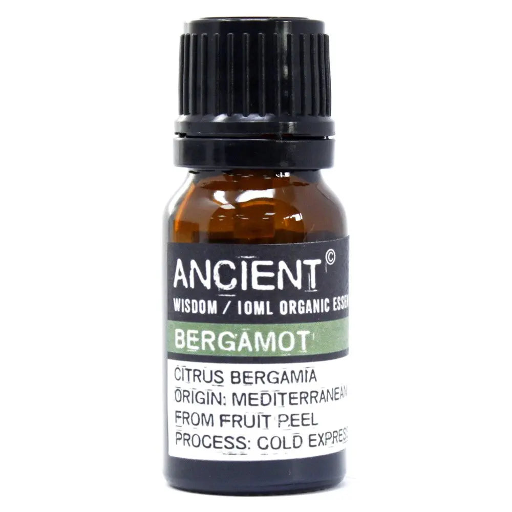 Frasco de vidrio ámbar de 10ml con tapa negra y etiqueta blanca y verde de aceite esencial de bergamota Ancient Wisdom.