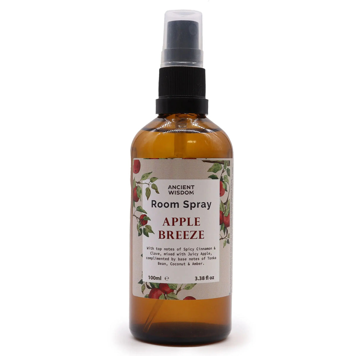 Spray ambiental de 100 ml en frasco de vidrio ámbar con atomizador negro y etiqueta con ilustración de manzanas.