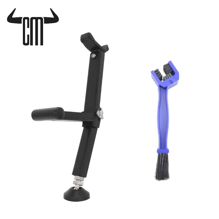 Black metal bike repair stand with adjustable clamp and blue plastic cleaning brush. Ideal for maintenance and repairs.