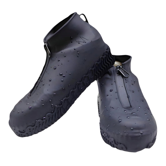Black waterproof ankle boots with zipper, featuring a textured sole and water droplets for added durability.