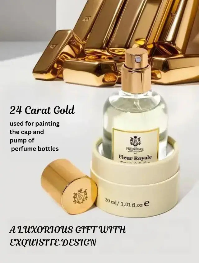 Fleur Royale perfume bottle with gold cap and pump, set in a round cream box against a background of gold-toned items.