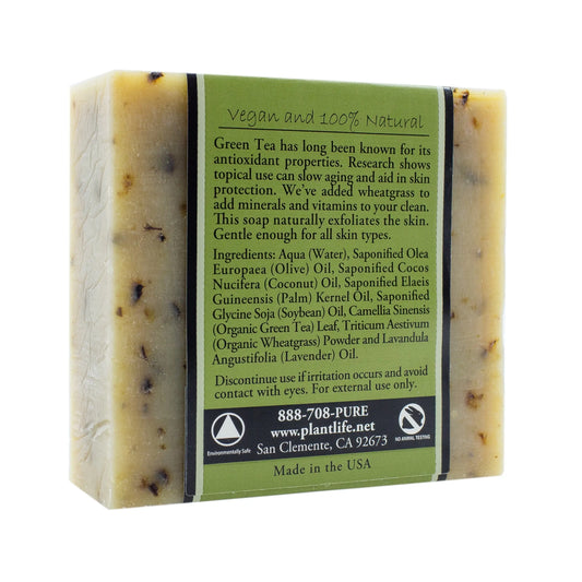 Green tea bar soap featuring a rectangular shape with visible botanical inclusions and a green ingredient label.