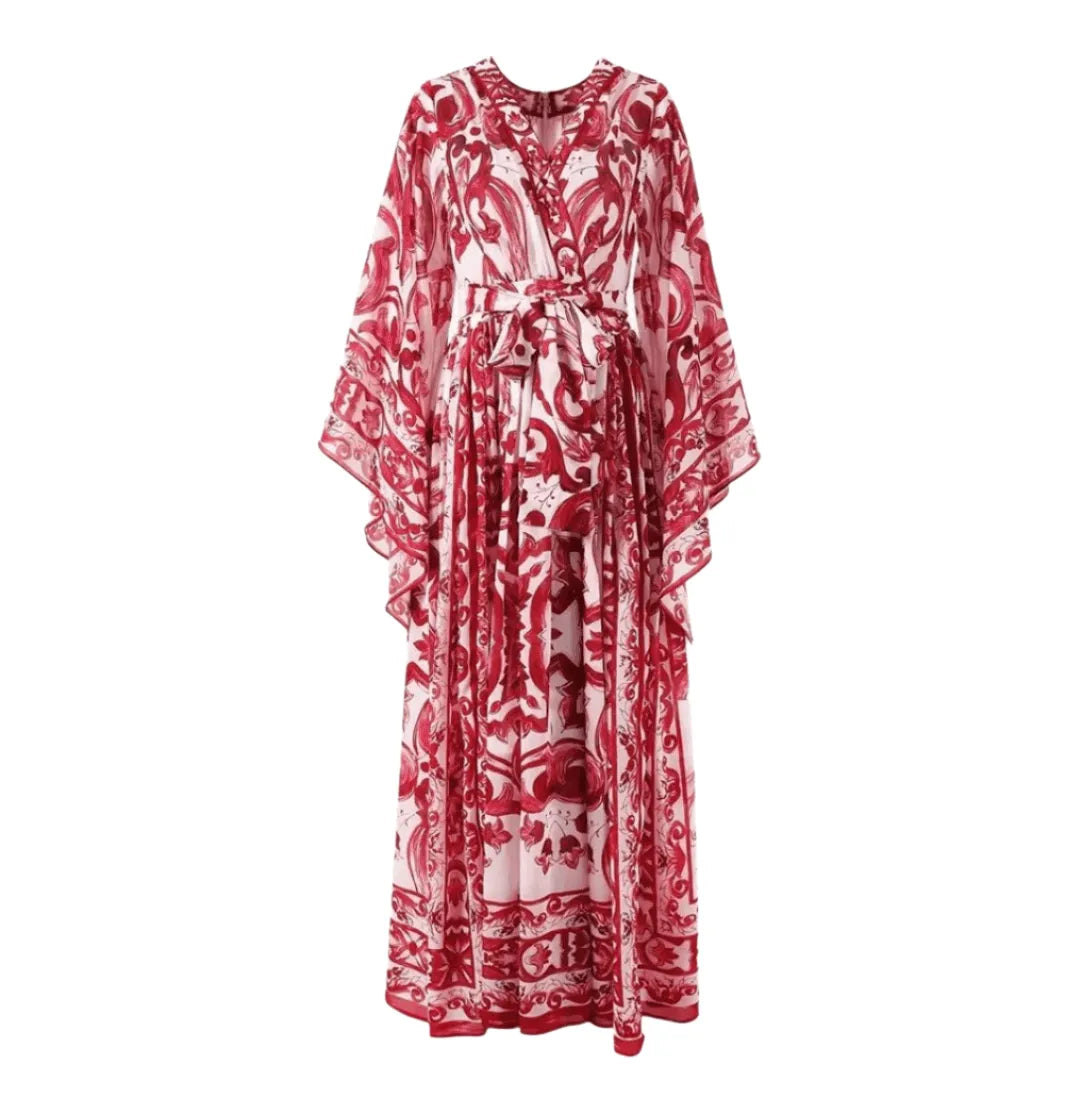 Red patterned maxi dress with kimono sleeves and a belted waist, perfect for summer occasions.