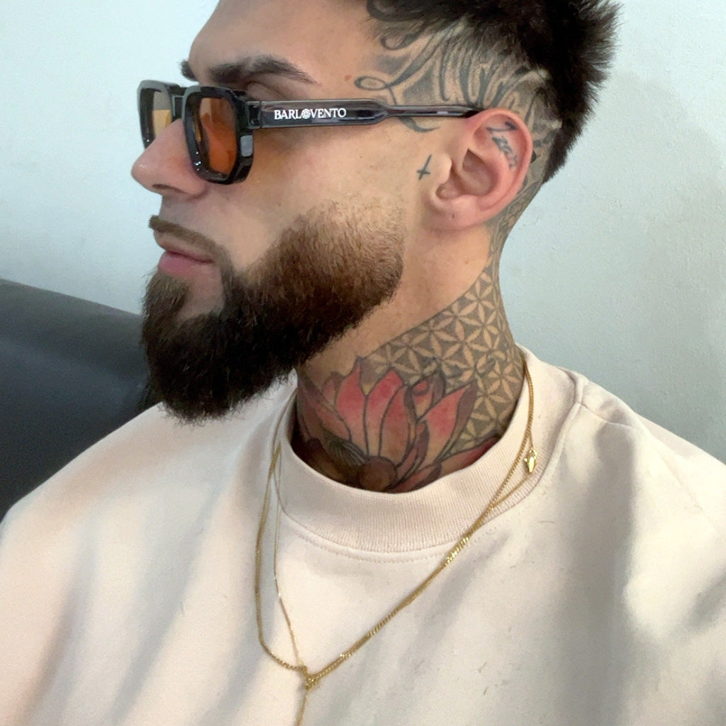 Médano · gafas de sol negras llamativas con lentes naranjas