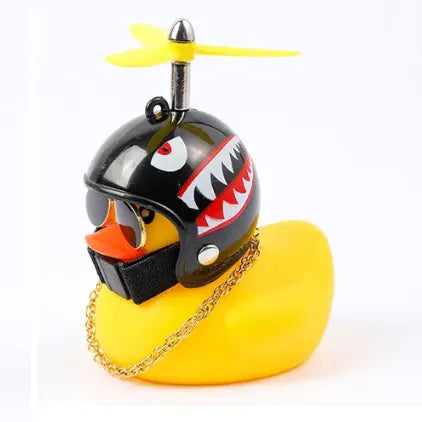 Yellow rubber duck with black helmet, yellow propeller, and gold chain, styled with shark teeth graphic.