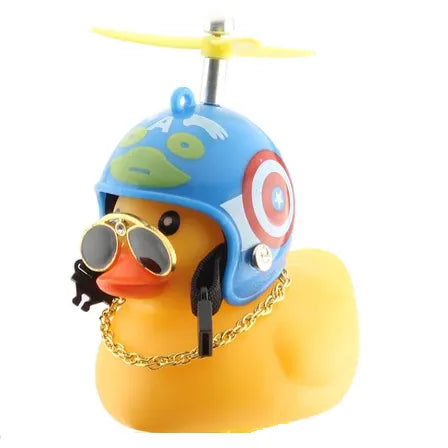 Fun yellow rubber duck wearing a blue propeller helmet, sunglasses, and a gold chain, perfect for playful decor.