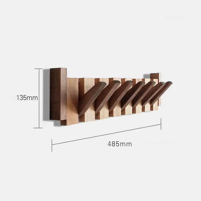 Perchero de pared plegable en madera natural clara y oscura con diseño escandinavo, incluye medidas técnicas.