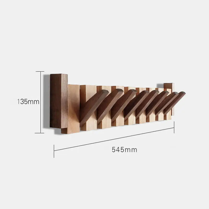Perchero de pared de madera natural con ganchos plegables de estilo escandinavo, diseño lineal con medidas detalladas.