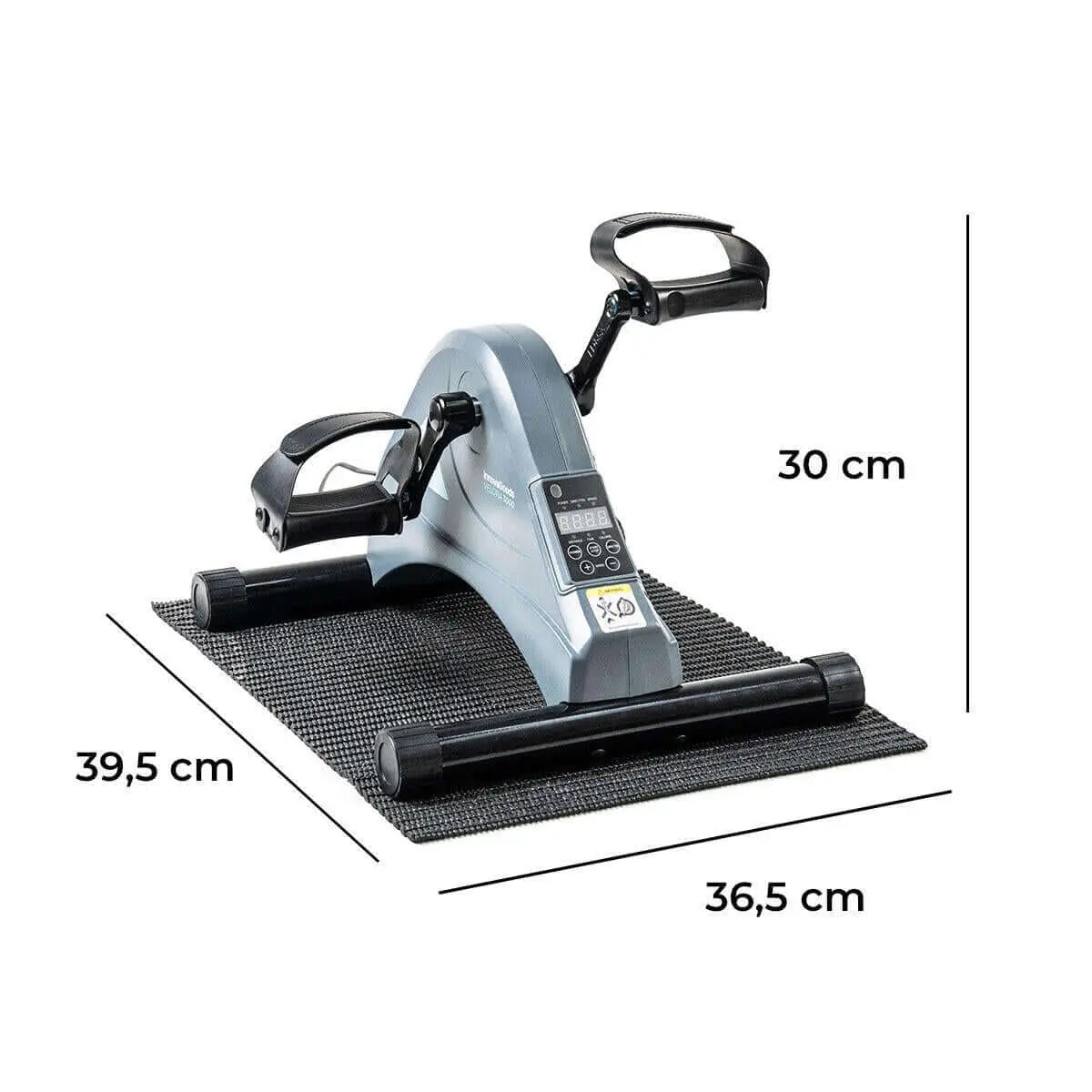 Pedaleador eléctrico gris para brazos y piernas, con pantalla digital, pedales negros y alfombrilla antideslizante.