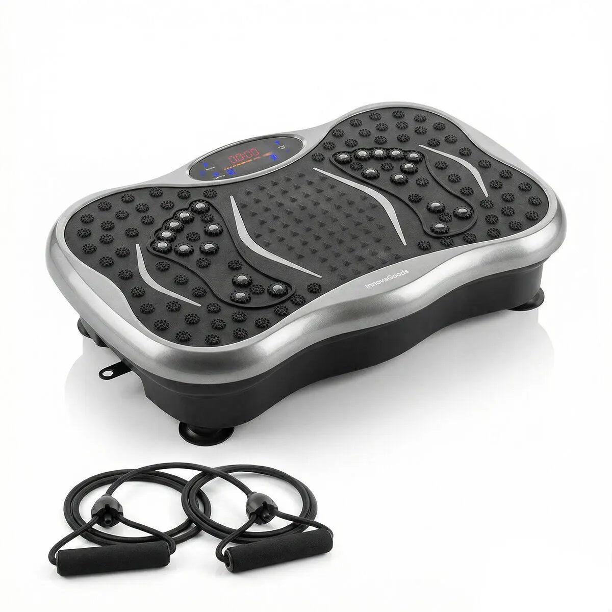 Plataforma vibratoria gris y negra con pantalla digital, puntos de masaje en la superficie y bandas de resistencia.