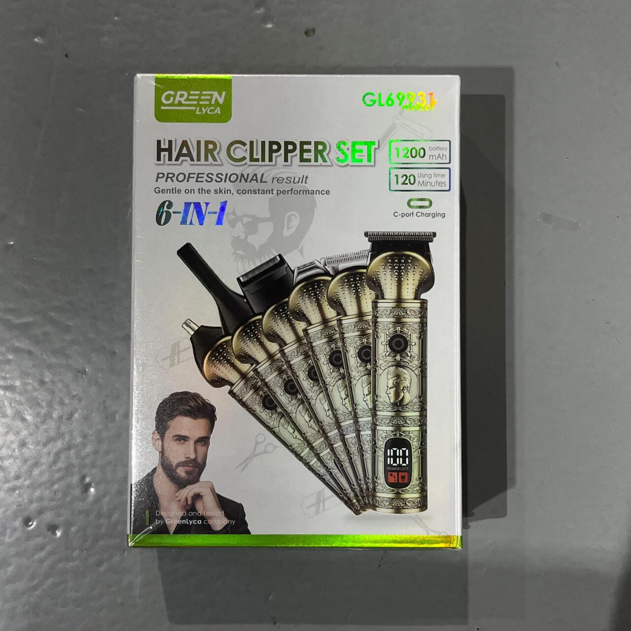 Caja de Máquina Cortapelo 6 en 1 con batería de 1200mAh y set de cortadores, ideal para cuidado personal.