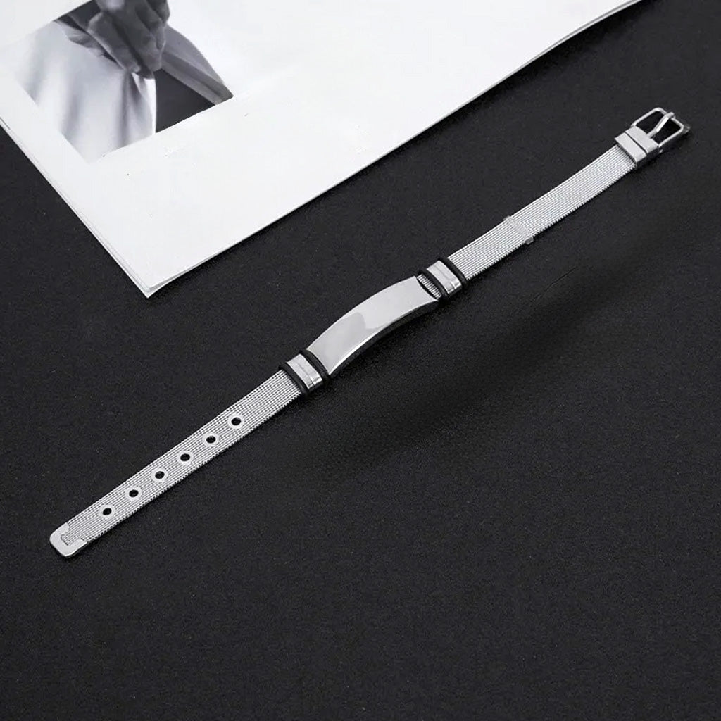 Pulsera Orión · Brazalete ajustable de acero de titanio con correa de reloj