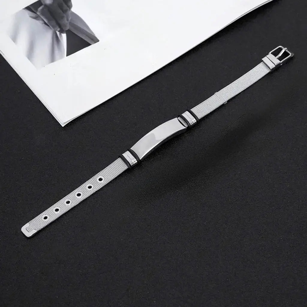 Pulsera Orión · Brazalete ajustable de acero de titanio con correa de reloj