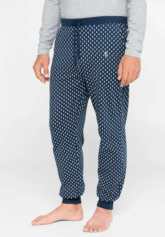 Pantalón de pijama largo para hombre en punto de algodón azul con estampado geométrico y ajuste cómodo.