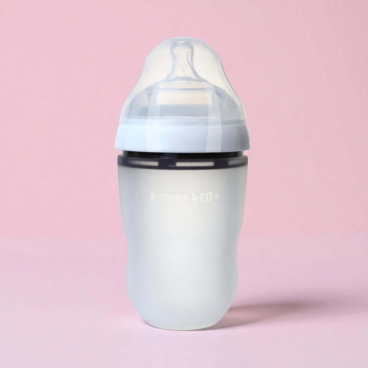 Pack Biberon flujo lento + Chupete Clásico Rosa Chicle Nenina & Co